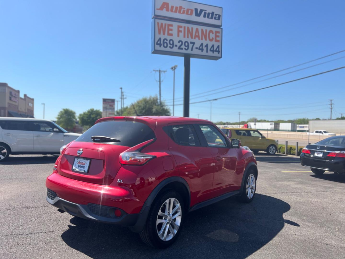 2015 RED Nissan Juke S FWD (JN8AF5MR3FT) with an 1.6L L4 DOHC 16V engine, Continuously Variable Transmission transmission, located at 420 I-35E, Lancaster, TX, 75146, (469) 297-4144, 32.593929, -96.823685 - Photo#6